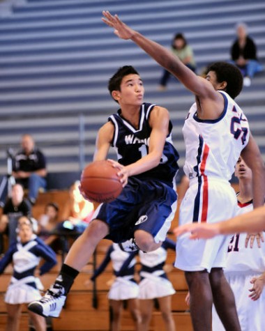 20081219_x-isaak_1515 Waiakea's Issak Janado soars to the basket. He scored 17 points for the victorious Warriors.