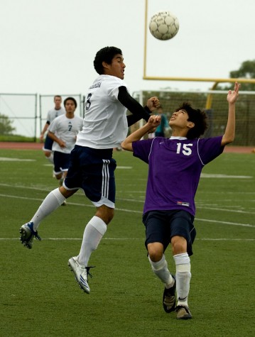 20090103_headers Kamehameha-Hawaii's Reyn Clarke (3), left, and Makua Lani's Brandt Mabuni (15) battle for the ball during second BIIF soccer action in Keaau Saturday afternoon.