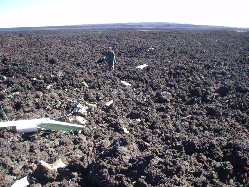 mauna loa glider wreckage A park ranger examines glider wreckage Sunday, Jan. 18 on Mauna Loa. (National Park Service photograph by John Anderson