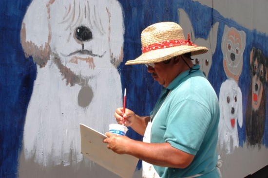 mike-sakamoto Mike Sakamoto on Oct. 8, 2005 while painting a wall surrounding the construction site of new State Judiciary building across the Hilo Lagoon Center. Photo by Rick Ogata/Special to Hawaii 24/7