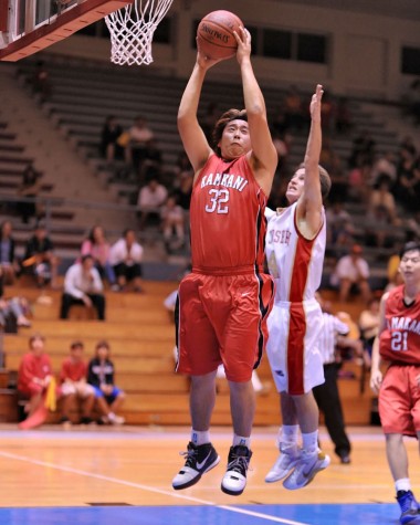 rnm-090130_0002 HPA's Keita Kiyomitsu goes high for a rebound over St. Joseph's Jacob Andrade.