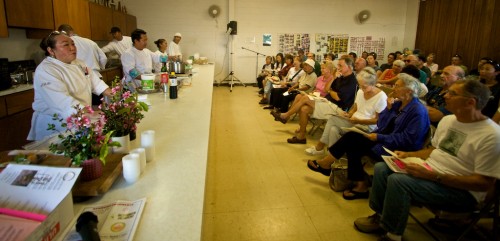 20090206_cookingdemo Dee Ann Tsurumaki, left, Chef de Cuisine from The Canoe House at Mauna Lani Bay Hotel and Bungalows briefs the audience on the Seared Nori Ahi with Soy Mustard Port Sauce she and her crews put together for a cooking demonstration at Kamuela Hongwanji Mission at Church Row.