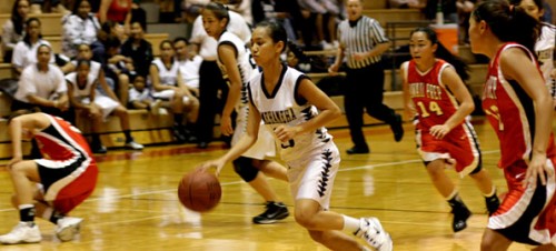 20090214_chelsea-poe Kamehameha-Hawaii's Chelsea Poe (3) takes the stolen ball to the hoops during first half action against Hawaii Prep during the D-II championship game at Castle Gymnasium on the HPA campus. Kamehameha-Hawaii leads Hawaii Prep at the half 29-17.