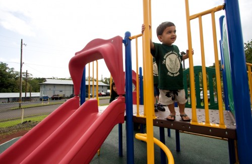 20090313_pahoa-playground-keiki Tai Rapoza, two years-old, of Montessori Country School tries out the new playground equipment in Pahoa.