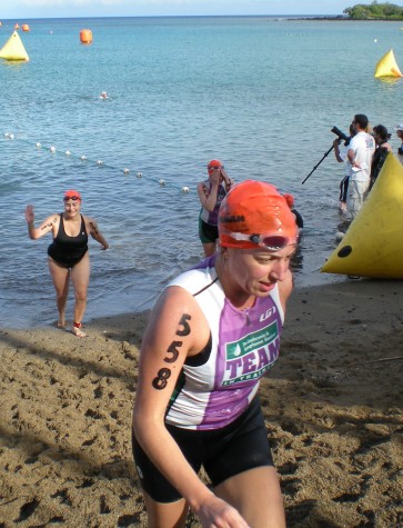 stephswim Stephanie Cristalli finishes the swim leg. The Waikoloa Lavaman Triathlon was Cristalli's first ever race. (Hawaii247.com photo by Karin Stanton)