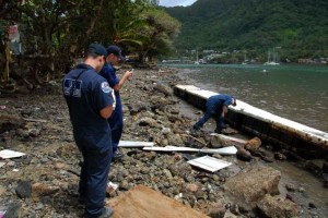 20090930_samoa-earthquake PAGO, PAGO, American Samoa - U.S. Coast Guard Shoreline Cleanup Assessment Team (SCAT) members from Coast Guard Sector Honolulu and Marine Safety Detachment American Samoa survey pollution and debris, Wednesday, Sept. 30, 2009. (U.S. Coast Guard photo/Petty Officer 3rd Class Luke Clayton)