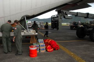 20090930_samoa-earthquake-c130 PAGO, PAGO, American Samoa - A Honolulu-based U.S. Coast Guard C-130 long-range search plane from Air Station Barbers Point arrives in Pago Pago, Wednesday, Sept. 30, 2009, to deliver aid and assess damage after a powerful earthquake and tsunami hit the U.S. territory. (U.S. Coast Guard photo/Petty Officer 3rd Class Luke Clayton)
