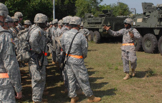 StrykerIndiaHorz First Sgt. Devin Winnegan, senior enlisted Soldier for Troop B, 2nd Squadron, 14th Cavalry Regiment "Strykehorse," 2nd Stryker Brigade Combat Team, 25th Infantry Division, from Schofield Barracks, Hawaii, gives soldiers a safety briefing before driving their recently unloaded Stryker vehicles. The squadron is participating in Exercise Yudh Abhyas 09 in Babina, India, which is scheduled for Oct. 12-27 and is a bilateral exercise involving the Armies of India and the United States. The primary goal of the exercise is to develop and expand upon the relationship between the Indian and U.S. Army. (Photo courtesy 2nd Stryker Brigade 25th Infantry Division)