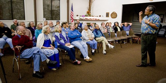 20091104_mayor-talkstory-volcano-t Mayor Billy Kenoi answers questions from residents during his talk-story session at Volcano's Cooper Center. Baron Sekiya for Hawaii 24/7.