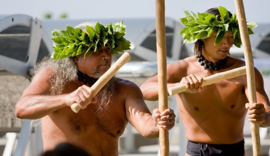 20091210_sopogy-halau-kupaaina The men of Halau Kupaaina perform during the dedication of a new solar farm by Sopogy called Holaniku at Keahole Point. (Hawaii 24/7 photo by Baron Sekiya)