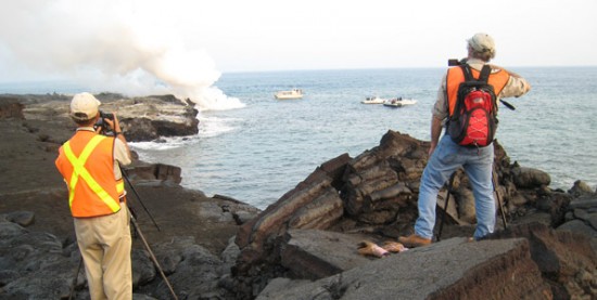 WaikupahanaPhotogs National Park Service volunteer photographers shoot the Waikupahana ocean entry flow Jan. 2, 2010. (Hawaii 24/7 photo by Karin Stanton)