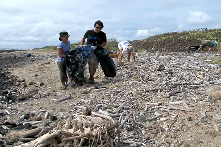 Hawaii County employees along with their family and friends worked on cleaning up Kamilo Beach in Kaâ€˜u for Earth Day on Saturday (May 1).