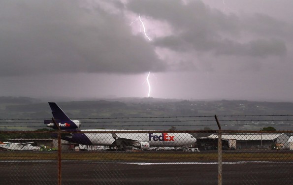 20110502_lightning-fedex-1 Lightning strikes Hilo as seen from Hilo International Airport Monday afternoon (May 2). Photography by Baron Sekiya | Hawaii 24/7