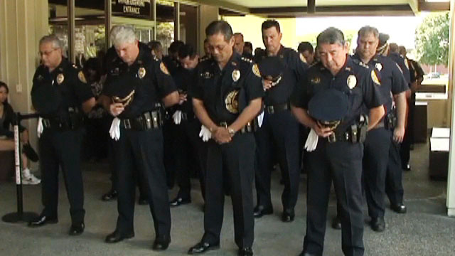 Members of the public helped the Hawai'i Police Department celebrate Police Week on Monday (May 16) at the Hilo police station.

The outdoor ceremony honored four Big Island police officers killed in the line of duty: Manuel Cadinha (1918), William "Red" Oili (1936), Ronald "Shige" Jitchaku (1990), and Kenneth Keliipio (1997).