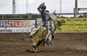 Hawaii_Island_High_School_Rodeo_Youth_Bull_Rider_TroyGomesofKona_2011_Photoby_Jock_Goodman Bull rider Troy Gomes, of Kona, in the Hawaii Island High School Rodeo. Photography by Jock Goodman.