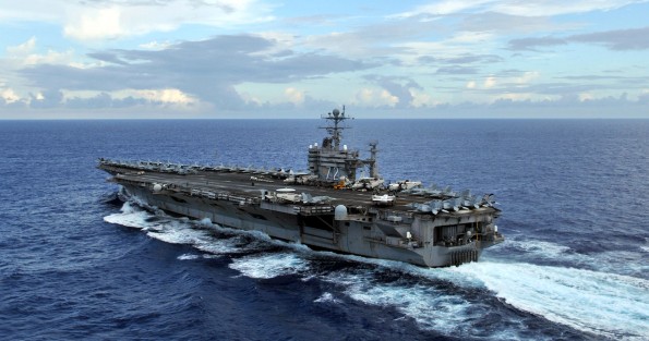 Pacific crossing for the USS Abraham Lincoln The aircraft carrier USS Abraham Lincoln is underway as evening falls during a transit of the Pacific Ocean. U.S. Navy photo by MC2 James R. Evans