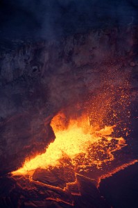 20121022_usgs-halemaumau-spatter Vigorous spattering was present this evening along the western margin of the summit lava lake. Occasional bursts, like the one shown here, appeared to send tiny bits of spatter up to the level of the floor of Halemaumau crater. Photo courtesy of USGS/HVO