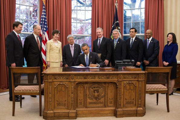 whistleblower-enhancement-act President Barack Obama signs S. 743, the Whistleblower Protection and Enhancement Act (WPEA), in the Oval Office, Nov. 27, 2012. Standing behind the President, from left, are: John Berry, Director of the Office of Personnel Management; Sen. Chuck Grassley, R-Iowa; Sen. Susan Collins, R-Maine; Sen. Daniel Akaka, D-Hawaii; Rep. Chris Van Hollen, D-Md.; Rep. Todd Platts, R-Pa.; Rep. Darrell Issa, R-Calif.; Rep. Elijah Cummings, D-Md.; and Special Counsel Carolyn Lerner. (Official White House Photo by Pete Souza)