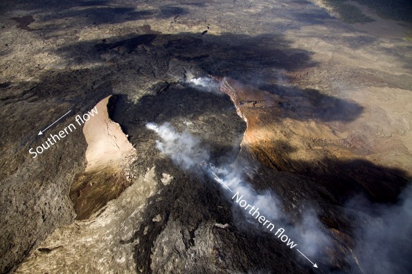 Lava flows have spilled from Puʻu ʻŌʻō crater over the past few weeks. One flow went out the southern end of the crater and traveled a short distance downslope to the southeast before stopping. The other flow, coming directly from the small lava lake on the northeast edge of the crater floor, went down the north flank of Puʻu ʻŌʻō and reached to the base of the cone. This flow is still active and its front has gone about 1.4 km (0.9 miles). Photo courtesy of USGS/HVO