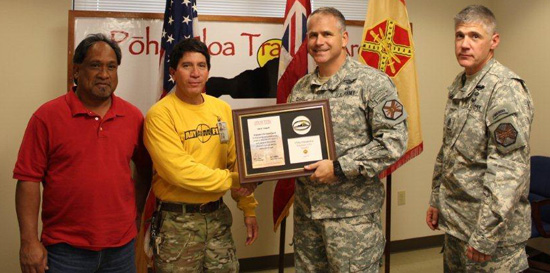 From left: Range maintenance supervisor Gerrit Pasco, Anthony "Tex" Texeira, Lt. Col. Eric Shwedo, Command Sergeant Major Alan Higgs. (Photo courtesy of PTA)
