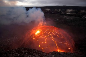 An active lava lake is contained within the Overlook crater, within Halema‘uma‘u Crater at the summit of Kilauea Volcano. The summit eruption began on March 19, 2008 and is now nearly five years old. The Hawaiian Volcano Observatory and Jaggar Museum are visible as a small bump on the horizon in the upper right portion of the image. Photo courtesy of USGS/HVO