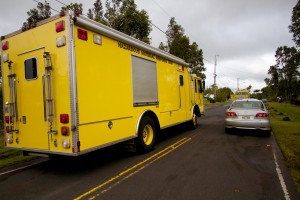 Traffic was diverted around the area of a structure fire in Kaumana as fire crews responded to the blaze. Photography by Baron Sekiya | Hawaii 24/7