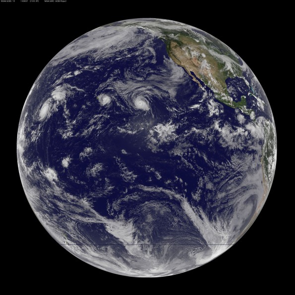 Full disk Earth image captured at 11 a.m. HST Thursday, August 7, 2014. You can clearly see Hurricane Iselle close to the Big Island while Hurricane Julio is flowing Iselle's lead. Image courtesy of NOAA-NASA GOES Project