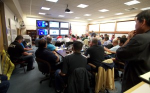 Officials being briefed by the Central Pacific Hurricane Center at Hawaii County Civil Defense Friday morning (Aug 8). Photography by Baron Sekiya | Hawaii 24/7