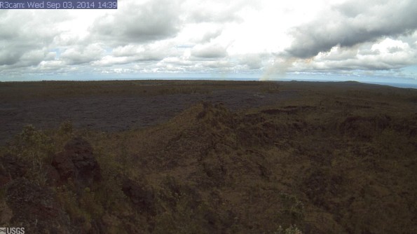 This image is from a research camera positioned northeast of Puʻu ʻŌʻō, near the east margin of the Puʻu ʻŌʻō lava flow field, monitoring the June 27th lava flow. The camera looks northeast, down the East Rift Zone. The cone near the right side of the image is Heiheiahulu. Image taken at 2:39 p.m. September 3, 2014. Photo courtesy of USGS/HVO