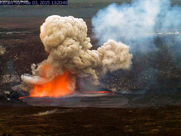 A portion of the Halemaʻumaʻu Crater wall collapsed at 1:20 p.m. Sunday, May 3, 2015, impacting the lava lake and triggering a small explosion of spatter and a robust particle-laden plume. Fist-size clasts were deposited around the closed Halemaʻumaʻu visitor overlook. Photo taken Sunday, May 3, 2015 courtesy of USGS/HVO