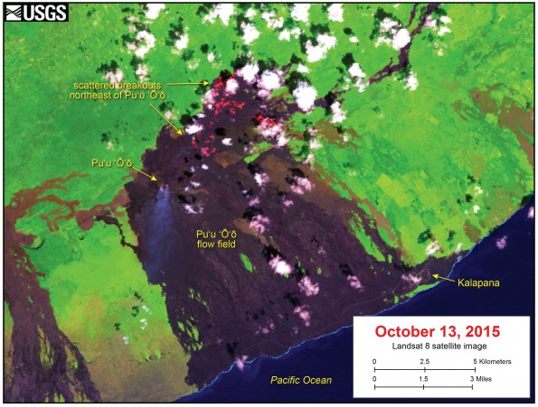 This satellite image was captured on Tuesday, October 13, 2015 by the Landsat 8 satellite. Although this is a false-color image, the color map has been chosen to mimic what the human eye would expect to see. Bright red pixels depict areas of very high temperatures and show active lava. White areas are clouds. The lava flow field is partly obscured by clouds, but the image shows much of the activity on the June 27th flow. Active breakouts are scattered over a wide area northeast of Puʻu ʻŌʻō, with the farthest active lava about 6.3 km (3.9 miles) from the vent on Puʻu ʻŌʻō.