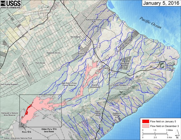 This small-scale map shows Kīlauea’s active East Rift Zone lava flow in relation to the eastern part of the Island of Hawaiʻi. The area of the flow field on December 3 is shown in pink, while widening and advancement of the flow field as mapped on January 5 is shown in red. The yellow lines show the active lava tube system. Puʻu ʻŌʻō lava flows erupted prior to June 27, 2014, are shown in gray. The black box shows the extent of the accompanying large scale map. The blue lines show steepest-descent paths calculated from a 1983 digital elevation model (DEM; for calculation details, see http://pubs.usgs.gov/of/2007/1264/). Steepest-descent path analysis is based on the assumption that the DEM perfectly represents the earth's surface. DEMs, however, are not perfect, so the blue lines on this map can be used to infer only approximate flow paths. The base map is a partly transparent regional land cover map from National Oceanic and Atmospheric Administration (NOAA) Office of Coastal Management draped over the 1983 DEM. The bathymetry is also from NOAA. Because the flow field is changing very little at the moment, mapping of the lava flow is being conducted relatively infrequently. We will return to more frequent mapping if warranted by an increase in activity.