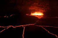 The summit lava lake in Halemaʻumaʻu Crater was at a high level earlier in the week, and partly visible from the Jaggar Museum Overlook at times. But over the past few days, the lake level has dropped slightly. Nevertheless, the activity on the surface of the lava lake has been typical of normal activity, with frequent spattering on the lake margins, as shown here. This view looks north from the rim of Halemaʻumaʻu Crater, which is closed to the public due to ongoing volcanic hazards. Photo taken Thursday, May 26, 2016 courtesy of USGS/HVO