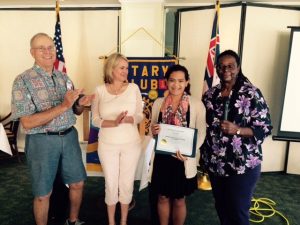 Hilo Bay Rotarians congratulate Jyselle Arruda on her scholarship award. Left to right, Richard Cunningham, Kim Keahiolalo, Arruda and Bettye Williams, RCHB president.