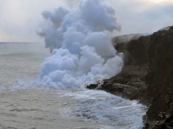The ocean entry at Kamokuna remains active, with a small lava delta. Views of the lava streams entering the water were obscured by the thick plume. Very weak littoral explosions were occurring. Photo taken Saturday, April 15, 2017 courtesy of USGS/HVO