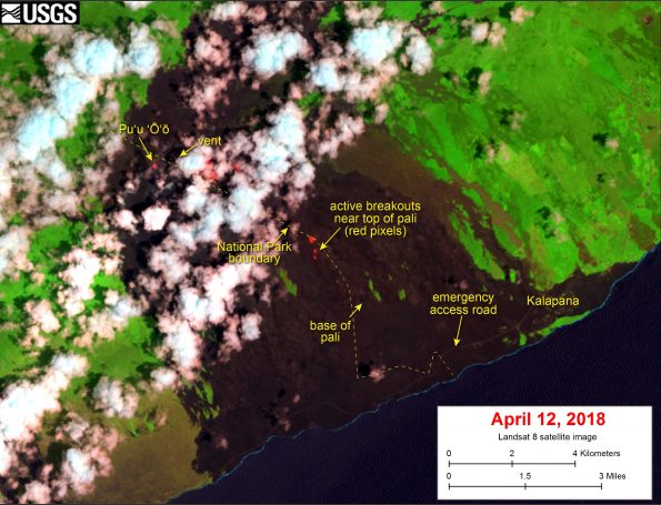This satellite image was captured on Thursday, April 12, by the Landsat 8 satellite. Although this is a false-color image, the color map has been chosen to mimic what the human eye would expect to see. Bright red pixels depict areas of high temperatures and show active lava. White areas are clouds. The image shows that breakouts continue in several areas on the flow field. The largest breakout is in the upper flow field, about 1 km (0.6 miles) east of Pu‘u ‘Ō‘ō. The closest breakouts to the coast include a few small areas that are active near the top of the pali.