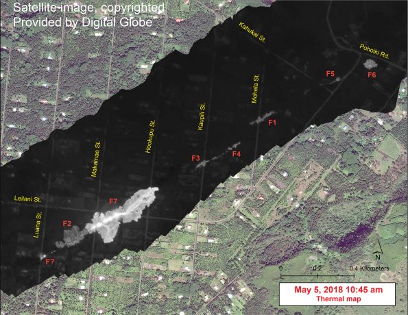 This map overlays a georegistered mosaic of thermal images collected during a helicopter overflight of the fissures in Leilani Estates, Island of Hawai‘i, at 10:45 a.m. HST on May 5. The base is a copyrighted satellite image (used with permission) provided by Digital Globe. Temperature in the thermal image is displayed as gray-scale values, with the brightest pixels indicating the hottest areas (white shows active breakouts). During the overflight, fissure 7 stands out as the first fissure to produce a small lava flow. When the thermal images were collected, the flow was about 260 m (853 ft) long. The thermal map was constructed by stitching many overlapping oblique thermal images collected by a handheld thermal camera during a helicopter overflight of the flow field.