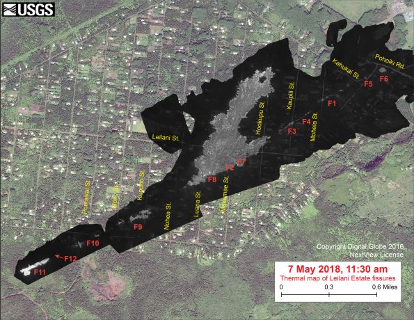 This thermal map clearly shows the fissure system during an overflight of the area this afternoon. The Fissure 8 flow is inactive, but Fissures 11 and 12 opened today. Fissure 12, which started shortly after the map was map, began around noon. The black and white area is the extent of the thermal map. Temperature in the thermal image is displayed as gray-scale values, with the brightest pixels indicating the hottest areas (whitish areas show the active lava flow). The gray linear features are the other fissures (numbered in red color) that have erupted thus far in the sequence. The thermal map was constructed by stitching many overlapping oblique thermal images collected by a handheld thermal camera during a helicopter overflight of the flow field. The base is a copyrighted color satellite image (used with permission) provided by Digital Globe.