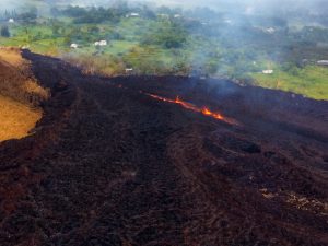 At about 07:00 a.m. HST, Fissure 17 as shown from the air. The HVO field crew reported that the spattering height and intensity at Fissure 17 seemed to have intensified slightly from yesterday, but the length of active spattering in the fissure is shorter. The overall vigor of Fissure 17 appears to have dropped over the past two days, accompanying a stalling of the Fissure 17 flow front. Photo taken Thursday, May 17, 2018 courtesy of U.S. Geological Survey