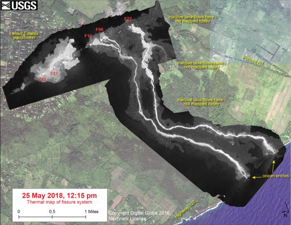 This thermal map shows the fissure system and lava flows as of 12:15 pm on Friday, May 25. Two channelized lava flows are reaching the ocean. In addition, a lava flow is active in Leilani Estates subdivision, near Fissure 7. The region east of the lava channels includes a broad area of recent but inactive lava flows, and this area was not mapped today due to lack of change (see earlier maps for the extent of these flows). The black and white area is the extent of the thermal map. Temperature in the thermal image is displayed as gray-scale values, with the brightest pixels indicating the hottest areas. The thermal map was constructed by stitching many overlapping oblique thermal images collected by a handheld thermal camera during a helicopter overflight of the flow field. The base is a copyrighted color satellite image (used with permission) provided by Digital Globe.