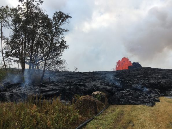 When molten lava encroaches on grassland, forests, or other vegetated land, subsurface pockets of natural gas from the burning plant material can ignite, causing a blast known as a “methane explosion.” To avoid this hazard, keep a safe distance—at least tens of yards—from the margin of an active lava flow in vegetated areas. USGS photo.