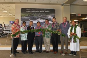 Interior rendering of the new Mauka Concourse at the Daniel K. Inouye International Airport. Holdroom rendering of the new Mauka Concourse at the Daniel K. Inouye International Airport. Aerial rendering of the new Mauka Concourse at the Daniel K. Inouye International Airport. Airlines Committee of Hawaii Co-Chair Blaine Miyasato (from left to right), House Vice Speaker Mark Nakashima, Governor David Ige, HDOT Director Jade Butay, Senate President Ronald Kouchi, Hawaiian Airlines President & CEO Peter Ingram, Hensel Phelps Vice President Thomas Diersbock, and Kahu Kordell Kekoa participate in the untying of the maile lei during the groundbreaking ceremony for the Mauka Concourse project.