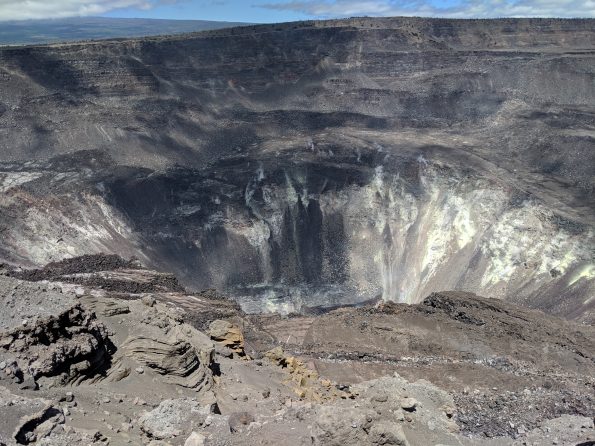Only small amounts of sulfur dioxide (SO2) and hydrogen sulfide (H2S) are currently being released from Kῑlauea, but they chemically react with each other (oxidation-reduction reaction) to form the bright yellow sulfur deposits visible on the crater walls within Halemaʻumaʻu. The current low sulfur emission rates at Kīlauea have contributed to beautifully clear skies in downwind areas. USGS photo by M. Poland, 03/22/2019.